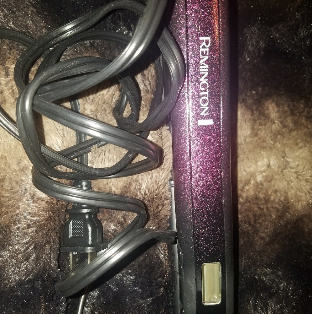 Used only a few times! Purple thin flatiron